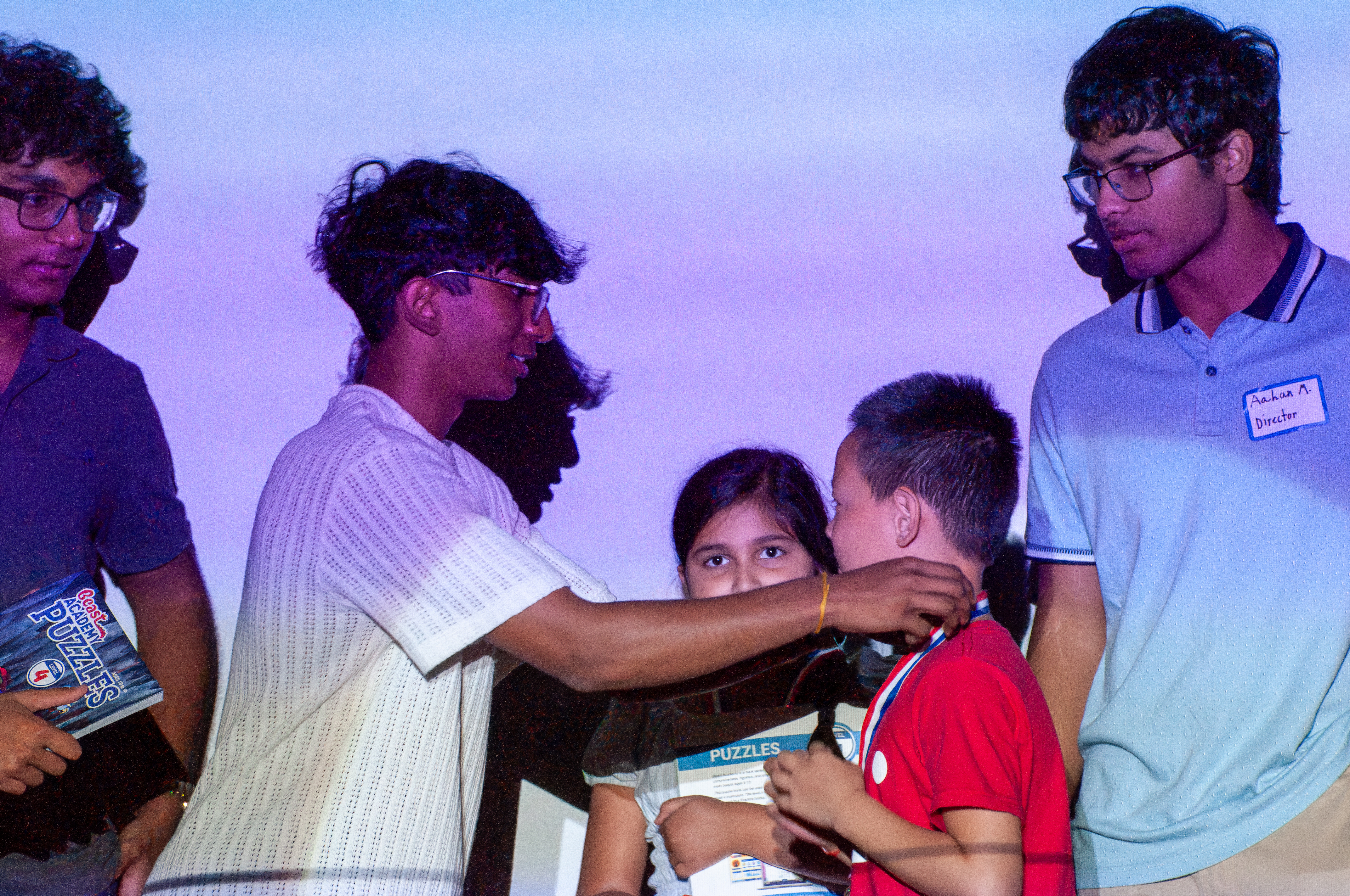 Audience photographing the ceremony