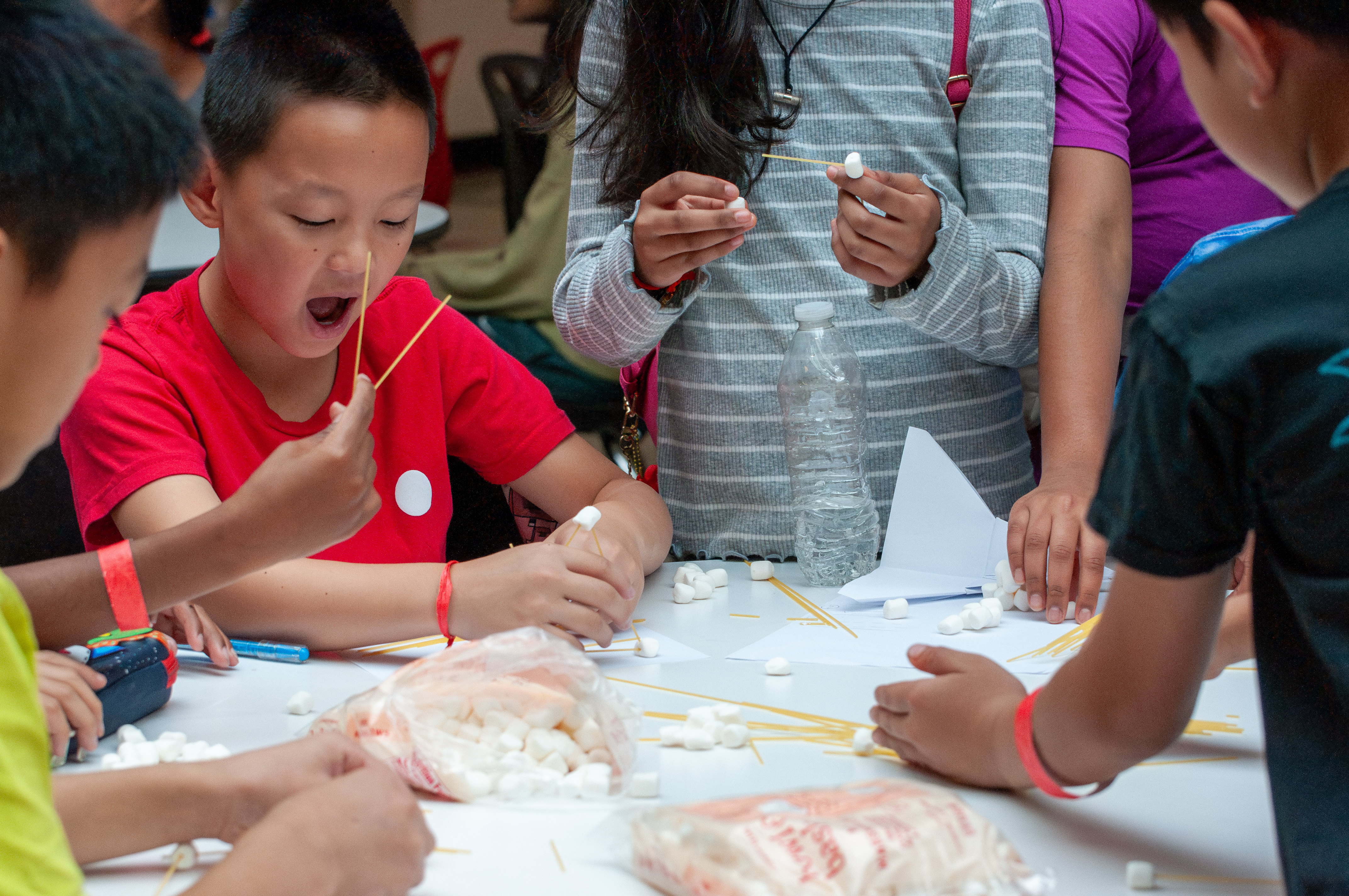 Volunteers assisting participants