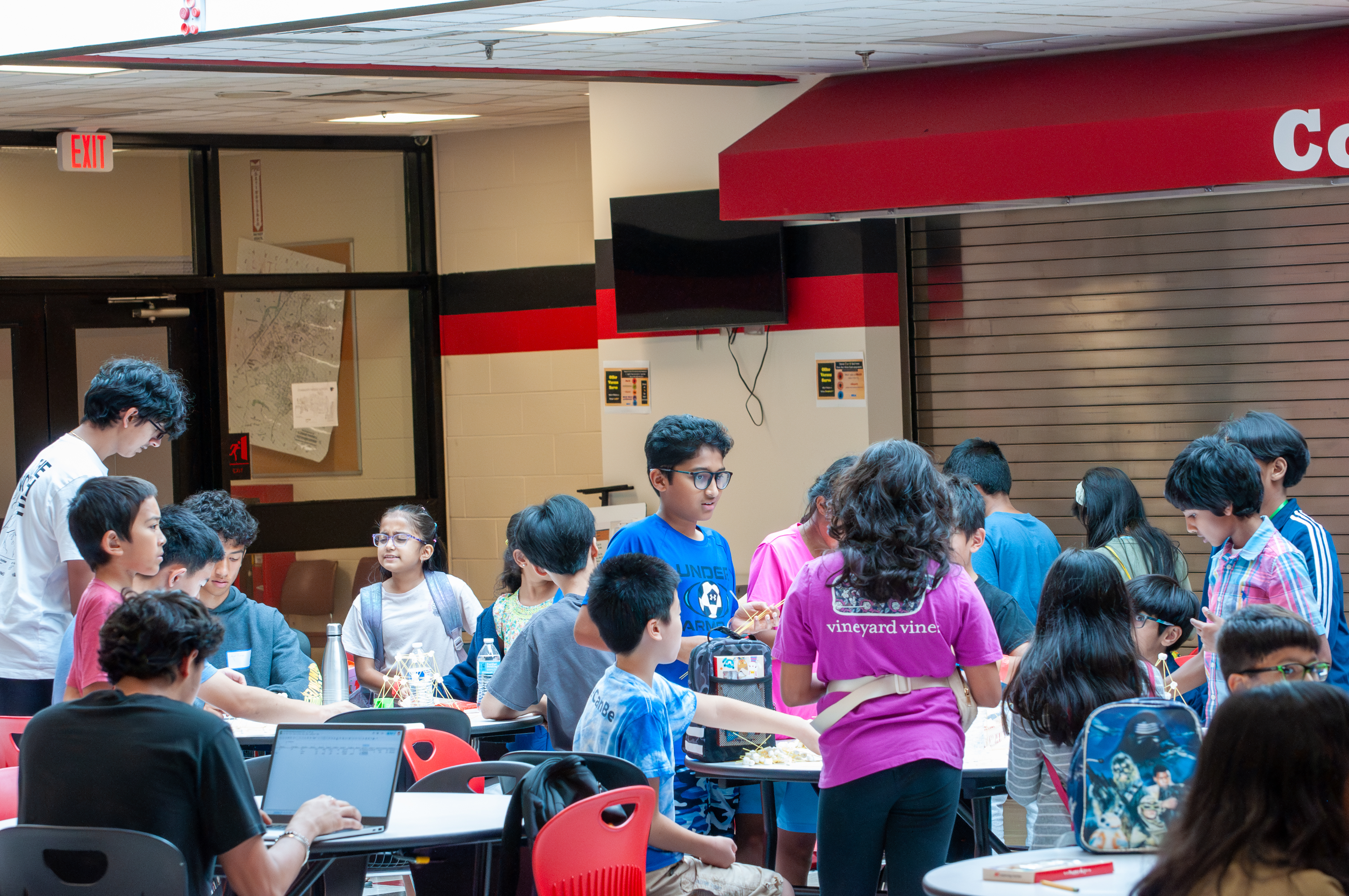 Volunteers answering questions