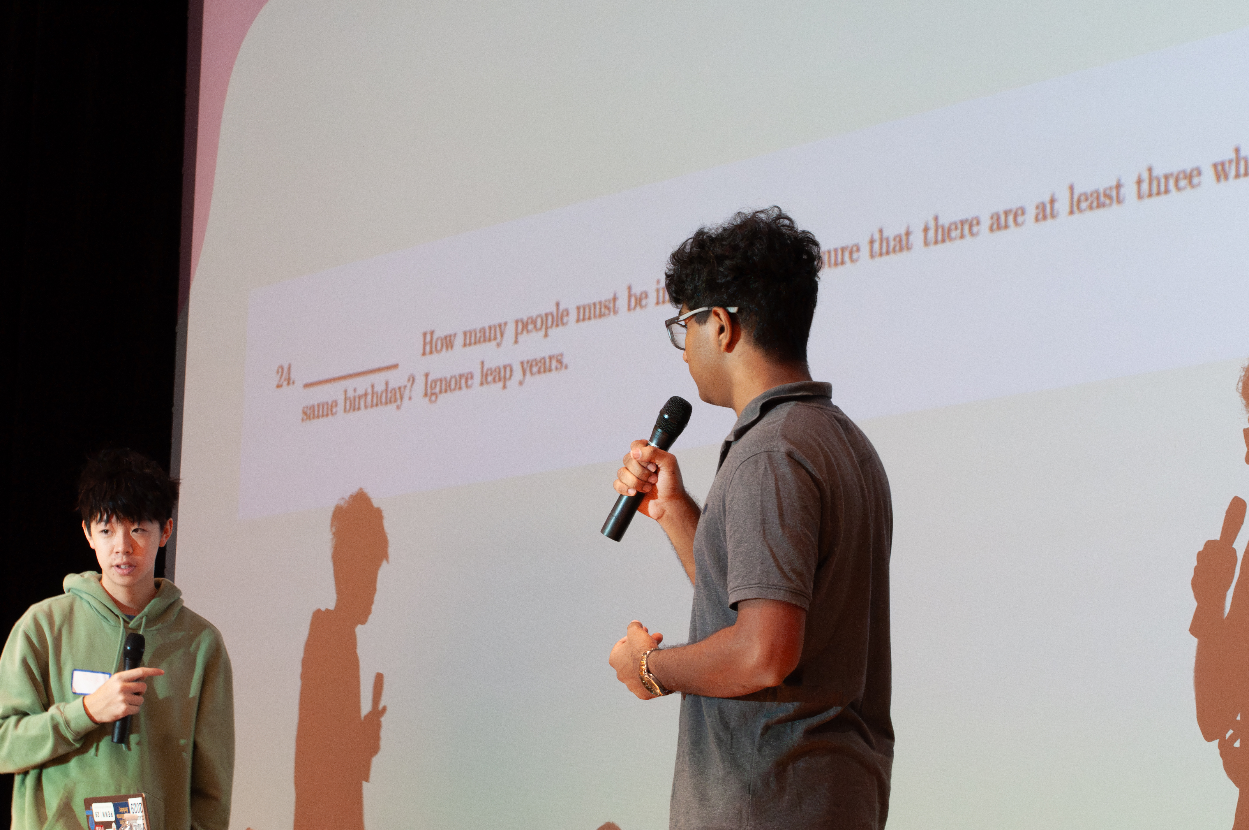 Students working at whiteboards